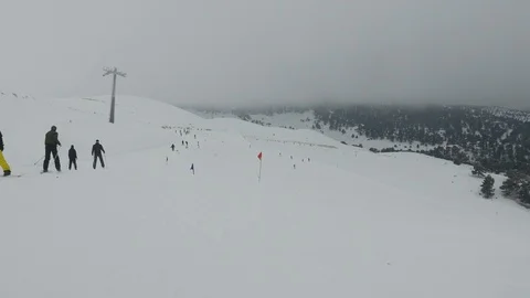 Skiing on the snowy mountains Stock Footage 123413780
