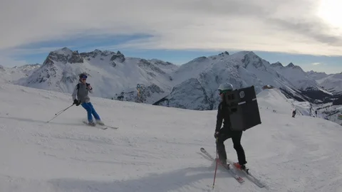 Skiing With Speaker on Back Vídeos de archivo 117830361