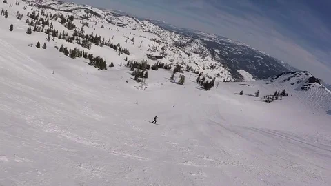 Skiing on top of Squaw Valley Stock Footage 74221019