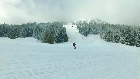 Skiing in the winter resort area. Stock Footage 72133606