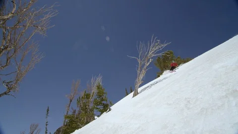 Skilful skier making turns while skiing snowy downhill Stock Footage 116744516