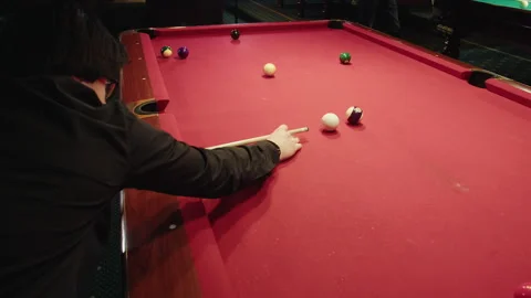 Skill development session for cue hitting in casual pub setting Video stock 329193003