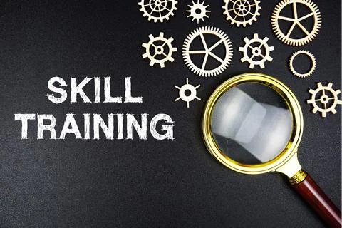 Skill Training text message with magnifying glass on black background Stock Photos