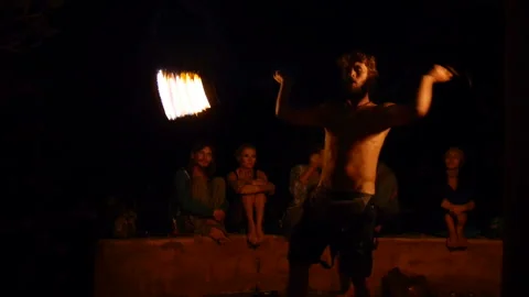 Skilled actor dances with burning torches at night display Video stock 102488866