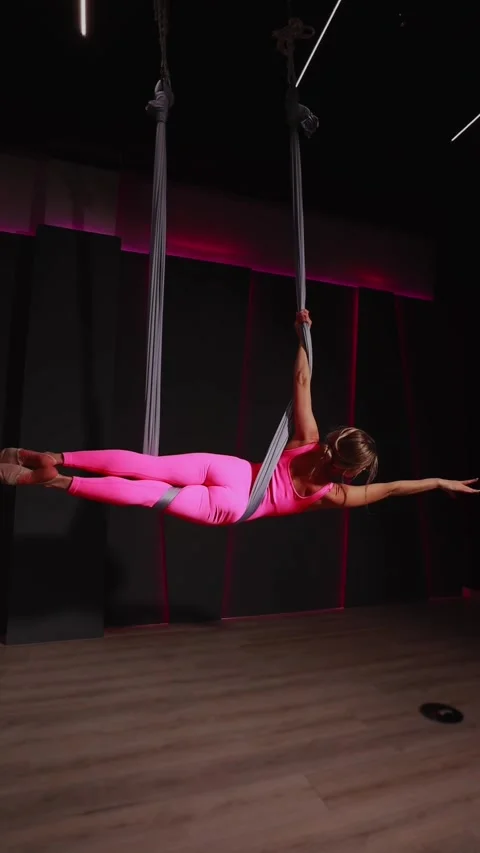 Skilled aerialist performing elegant silk dance, displaying powerful acroba.. Stock Footage 300378897