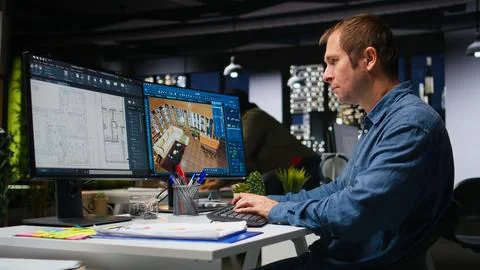 Skilled architect creating a 3D render of apartment interior layout Foto stock