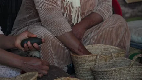 Skilled Artisan Weaving Baskets in Agafay Desert, Morocco Stock Footage 335912512