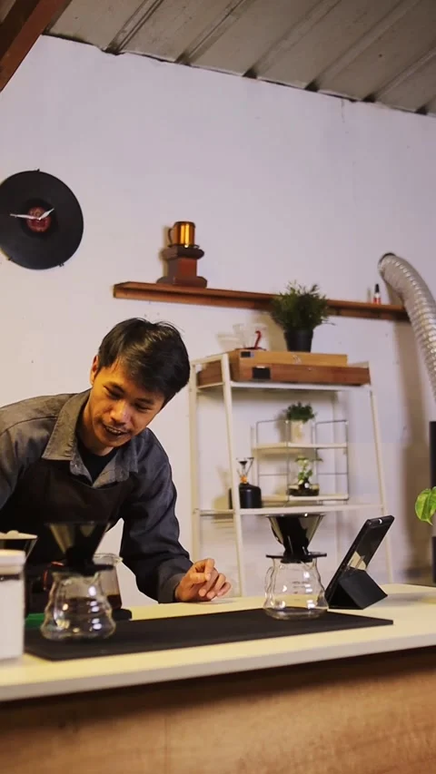 Skilled baristas provide tutorial on how to brew pour-over coffee carefully and 스톡 동영상 317259995