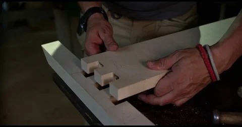 Skilled Carpenter Assembles Parts Of Wood Stock Footage 74605351