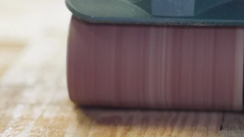 Skilled carpenter working in carpentry and sanding a piece of wood with belt Stock Footage 129023414
