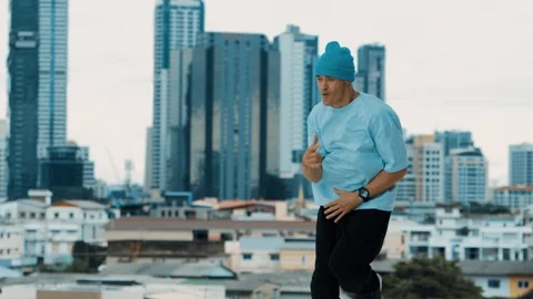 Skilled caucasian B-boy dancer practicing street dancing at rooftop. hiphop. Stock Footage 263678932