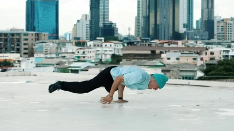 Skilled caucasian B-boy dancer practicing street dancing at rooftop. hiphop. Stock Footage 271200200