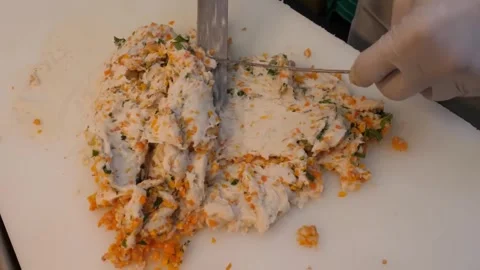 Skilled Chef Preparing Korean Fish Cake Batter with Finely Minced Vegetables Видео 337374990