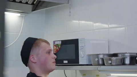 Skilled Chef Tossing And Stretching Dough To Prepare Tasty Ingredient For Pizza Stock Footage 243807221