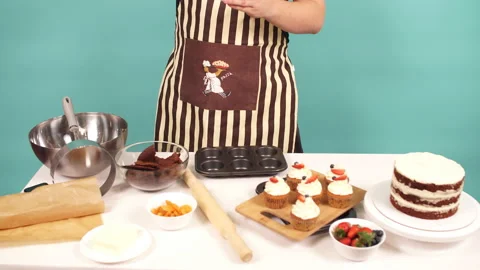 Skilled confectioner adding ingredients for preparation of dough, baking cake. Stock Footage 87299523
