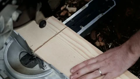 Skilled craftsman operates saw, cutting wood with precision and focus on detail Stock Footage 322071497