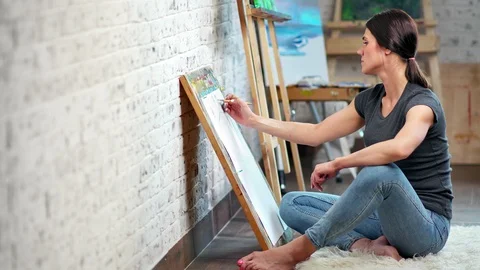 Skilled creativity female painter freehand drawing sketch on canvas full shot Video stock 109048355