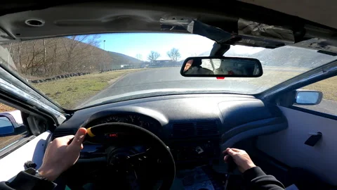 Skilled driver holding dangerous drifting maneuvers on competition playground Stockbeeldmateriaal 251917573