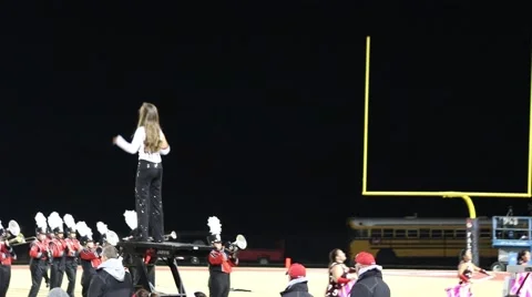 Skilled Drum Majorette Directs the Marching Band to the Last Bar of the Song Stock Footage 43482312