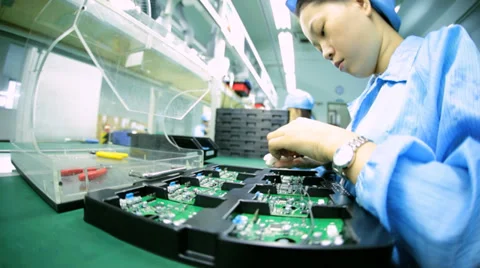 Skilled female Chinese worker manufacturing PCBs, China Stock Footage