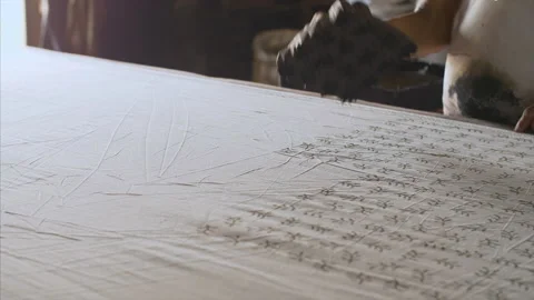 Skilled Indian artisan using dyed blocks to print fabric - block printing, Ra... 스톡 동영상 261032269