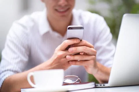  Skilled IT developer testing new software for digital devices on the smar... 스톡 사진