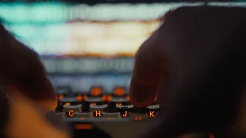 The skilled IT engineers fingers swiftly navigate computer keyboard carefull Stock Footage 331459475