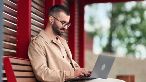 Skilled male business freelancer developer programmer working laptop on wooden Stock Footage 246137764
