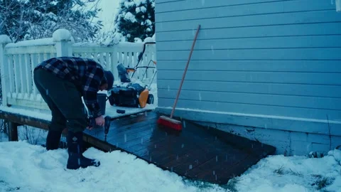 Skilled Man Doing Carpentry Outside Home Yard During Snowy Winter Season Stock Footage 300964821