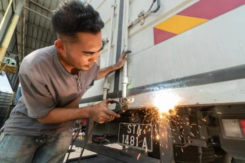 A skilled man welding Stock Photos