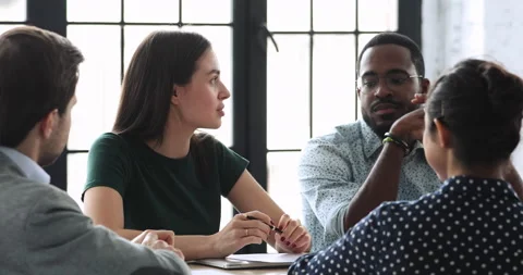 Skilled millennial diverse employees developing startup marketing strategy. Video stock 131252484