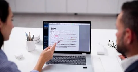 Skilled Online Editor Correcting Errors In Text Manuscript For Book. Stock Photos