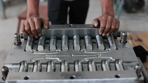 Skilled operators master manual drilling machines, crafting metal Stock Footage 250162100