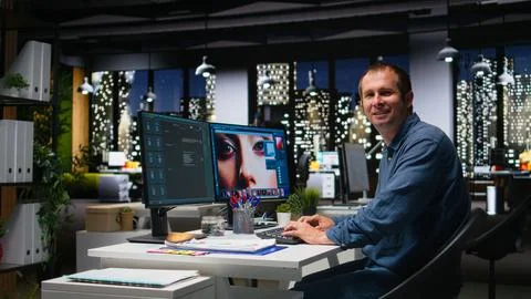 Skilled photo editor working on creative editing and generating content Stock Photos