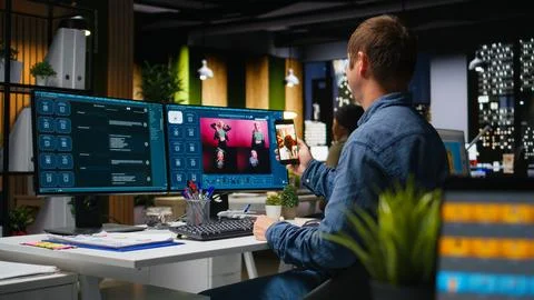 Skilled photo editor working on creative editing and generating content Stock Photos