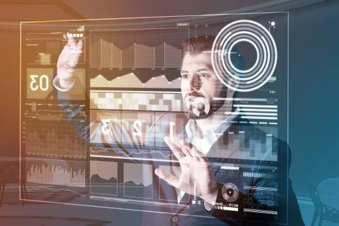 Skilled programmer looking interested while working with a modern computer Stock-Fotos