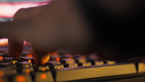 A skilled programmers finger flies across the computer keyboard rapidly typi Stock Footage 331456141