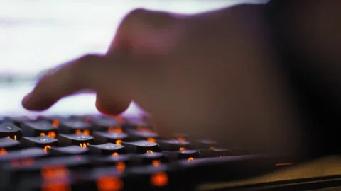 Skilled programmers fingers rapidly dance across the computer keyboard typin Stock-Footage 331462829