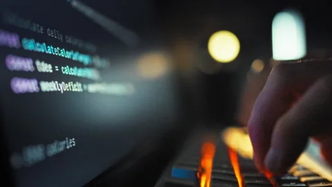 A skilled software professional rapidly types complex artificial intelligenc Stock Footage 331314908