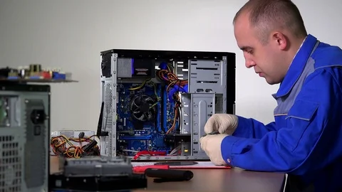 Skilled specialist man install ram memory plate to desktop computer Stock Footage 85643490