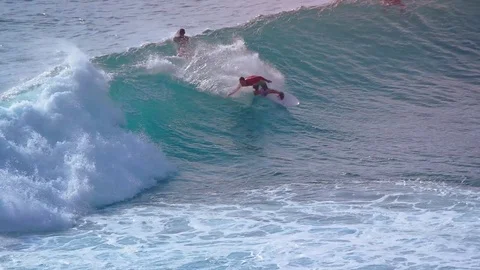 Skilled Surfer Riding a Wave in Bali, Indonesia Stock-Footage 71660370