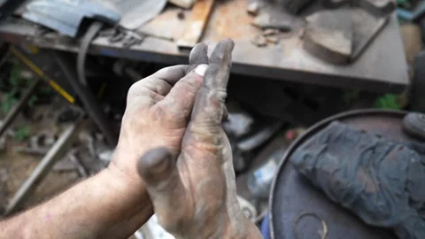 Skilled technician demonstrates precise hand movements while preparing tools for Video stock 334664415