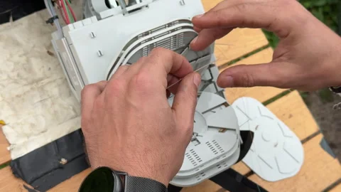 Skilled Technician Installing FTTH Equipment: Fiber Optic Cables Stock Footage 295031309