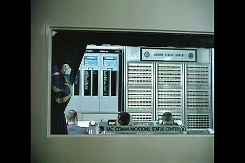 Skilled technician operates communication status center - 1964 Stock Footage 112149176
