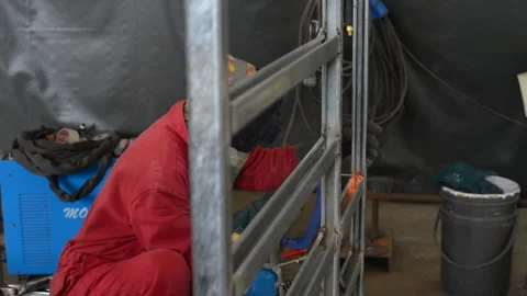 Skilled Welder Assembling Steel In A Fabrication Plant By Welding. slider Stock Footage 161477548