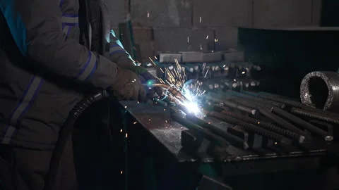 A skilled welder is engaged in work Video stock 317946399