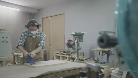 Skilled Woodworker in Workshop Focusing on Craftsmanship Stock Footage 318917774