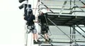 Skilled workers on stage concert HD Footage