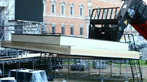 Skilled workers on stage concert (fork lift) Stock Footage 11028626