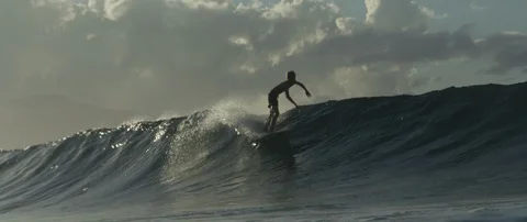 Skillful surfer jumping over the wave during surfing Stock-Footage 108642458